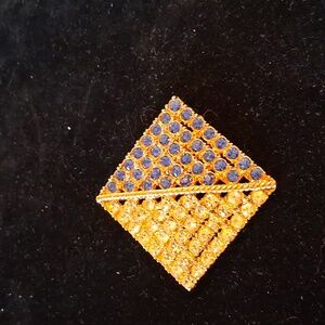 Vintage rhinestone-encrusted pyramid-shaped broach
